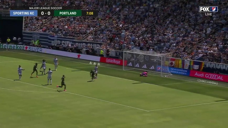 Franck Boli sneaks the ball in with finesse to help Portland grab a 1-0 lead against Sporting KC